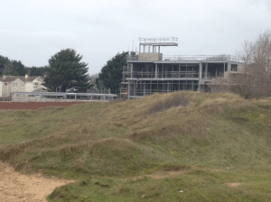 Gerwyn's luxury retirement home looking like a multi-storey car park a year ago, and with the only visible addiation this year of some glazing, looking like a small supermarket at the moment.